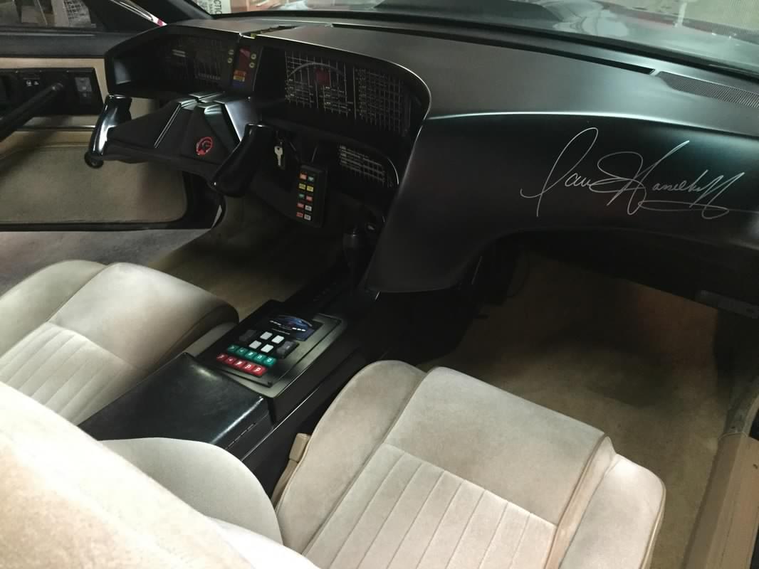 Screen-accurate KITT replica interior dashboard featuring an authentic signature from David Hasselhoff on the passenger-side dash.