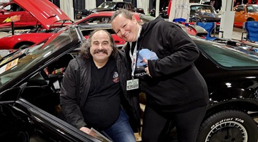 Avery Shoaf from Rust Bros is sitting in KITT at Motorama Toronto