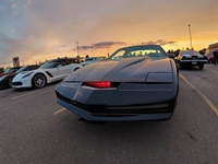 Close-up front angle of the KITT replica nose cone, highlighting the functional iconic red halogen scanner light bar.